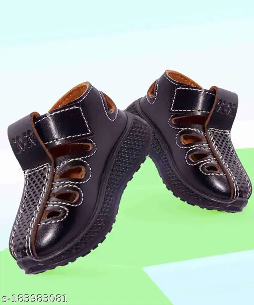 Black and brown children's sandals with multiple adjustable straps