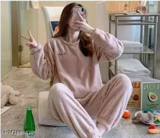 Women's pink wool winter nightsuit with long sleeves and printed net pattern, warm and cozy for chilly nights