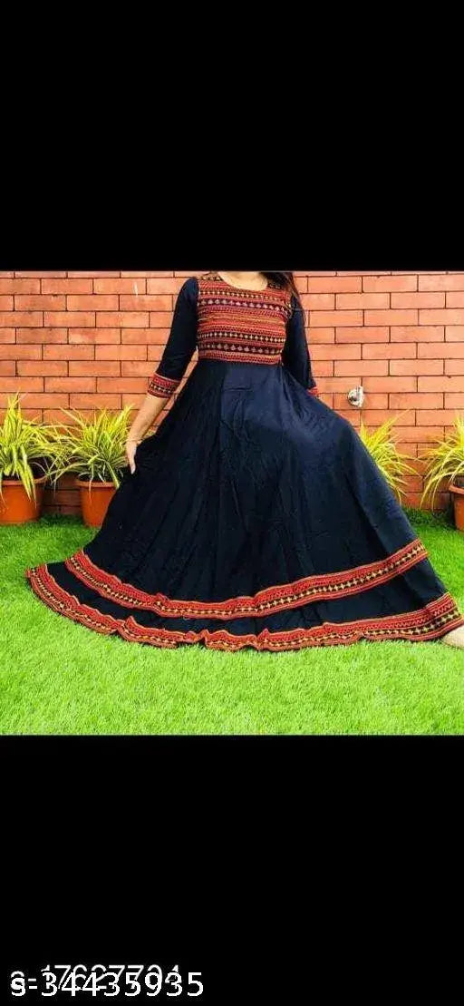 Black rayon embroidered gown with long sleeves and knee length