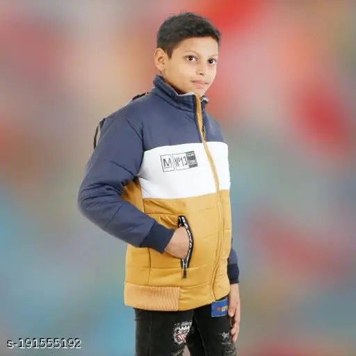 A boy in a blue, black, and yellow jacket