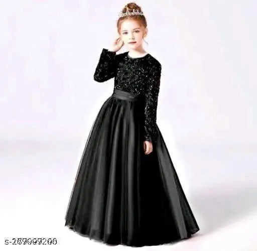 Black long sleeved tulle ball gown with ruffled hem