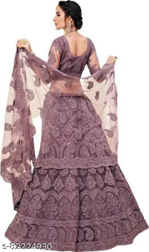 Indian Chikankari embroidered lehenga choli and dupatta set in net fabric, featuring heavy work embellishments and stone detailing