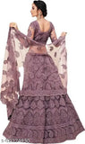 Indian Chikankari embroidered lehenga choli and dupatta set in net fabric, featuring heavy work embellishments and stone detailing