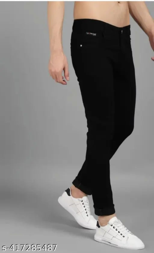 Comfy stretchable men's black cotton jeans, mid-rise with slim fit and washed pattern, perfect wardrobe addition. Sizes: 28, 30, 32 (Waist 28/30/32, Hip 35/37/39, Length 40in). India-made style