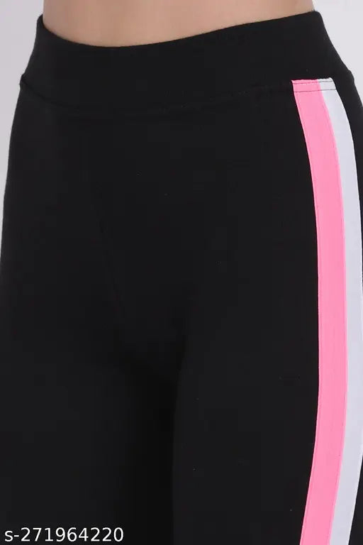 Stylish striped elastane jegging, black and white stripes, women's fashion clothing item on model