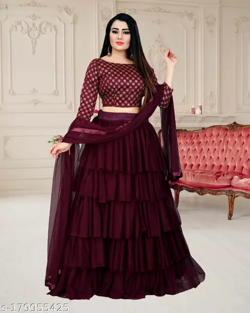 Embellished satin-sleeve lehenga set (12-16 years) in net fabric, ruffle stitch type, semi-stitched. Indian party wear or wedding festive clothing