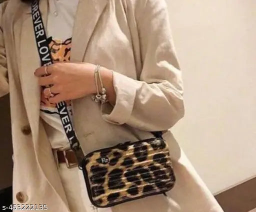 Forever Young sling bag, black with silver studs, crossbody style