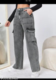 Dark blue denim jumpsuit with six pockets, oversized fit
