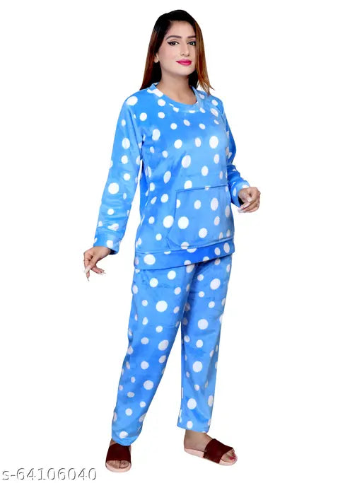Blue velvet pajama set by NACNO, featuring polka dots design and long sleeves. Hand wash only