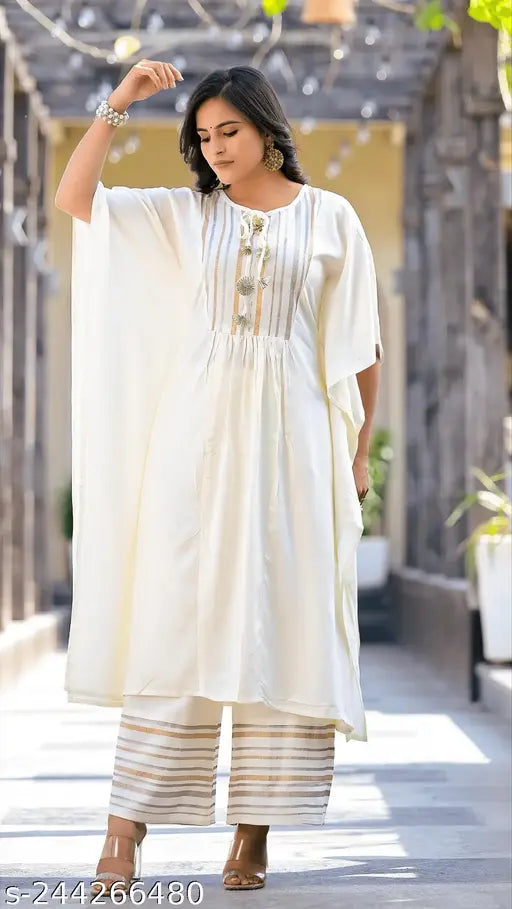 OffWhite rayon kaftan pant set, printed net with three-quarter sleeves, cream color on display stand