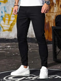 Men's solid black slim-fit denim jeans