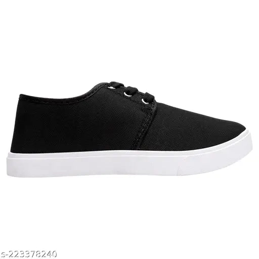 Black canvas sneakers with white soles and black laces