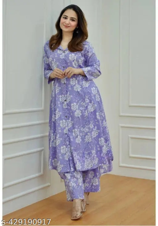 Printed rayon and viscose Kashvi Graceful Women Kurta Set with three-quarter sleeves and matching pants, featuring a vibrant pattern on net fabric. Single set available in sizes M & L from India