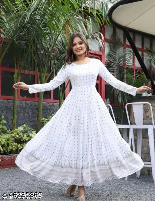 White embroidered sari with flare hem, long sleeves