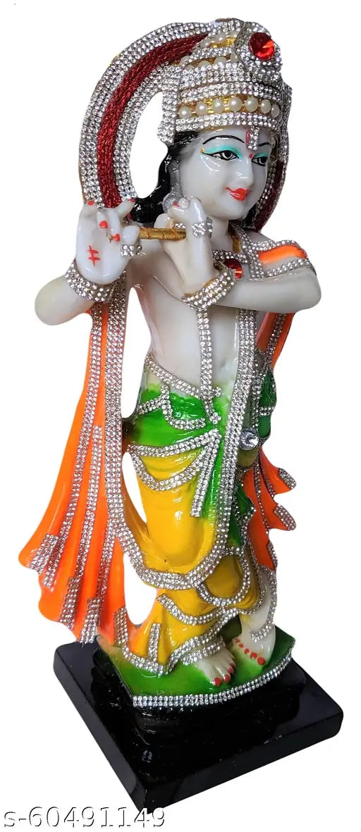 Resin Lord Krishna statue for puja gift, 11 cm length, 31 cm height, 10 cm breadth. Handcrafted with white marble finish, multicolor dressed Krishna idol playing Murli on wooden log