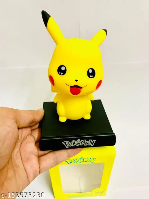 Yellow Pikachu dashboard art, cute car decor item from India