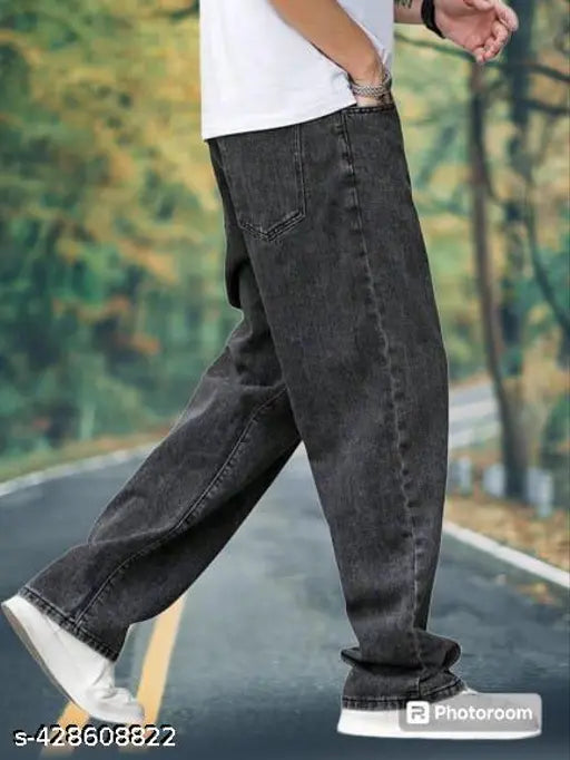 Denim baggy jeans by Malik Fashio, size 34/waist 34in, length 40in, hip 35in. Solid color men's denim clothing
