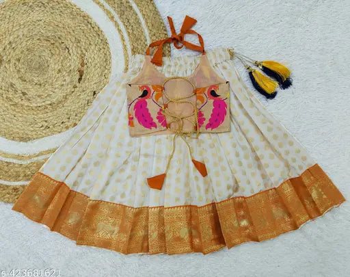 Orange jacquard lehenga choli for kids, traditional Indian attire in art silk fabric, ready-to-wear