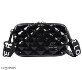 Black colored, shiny, boxed, bubble patterned style mini handbag with a thin strap