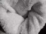 Woolen ladies cap with fur lining and pompom top detail