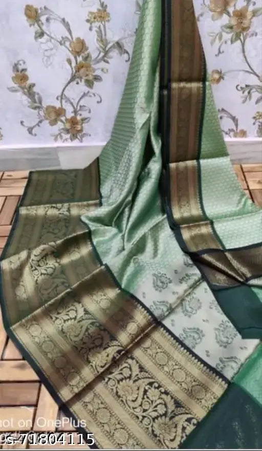 Kora muslin sari in green with pallu