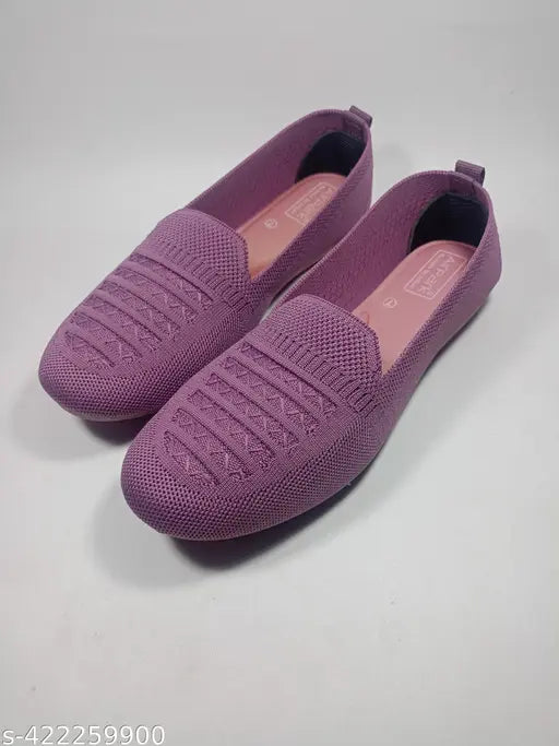Purple knit sneakers. Comfortable, woven upper, slip-on style.