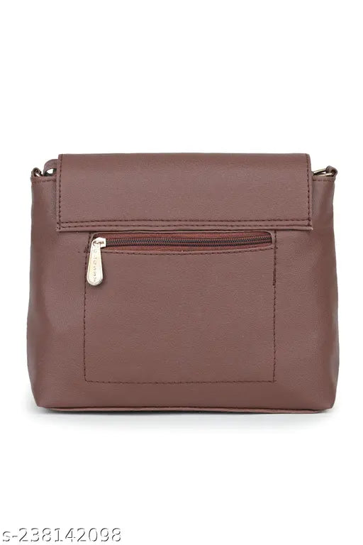 Maroon leather sling bag with adjustable shoulder strap and small front pocket