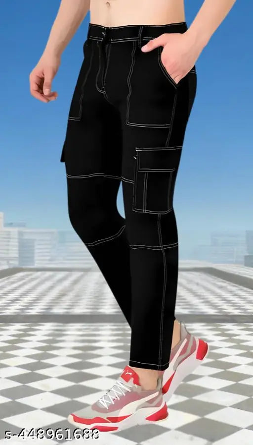 Black baggy denim jeans with zip fly, elastic waistband, fitted through thighs