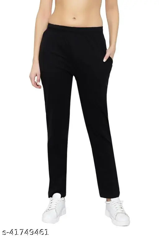 Trendy black sweatpants with a cropped top
