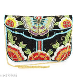 Designer black beaded clutch with butterfly accents, gold chain shoulder strap