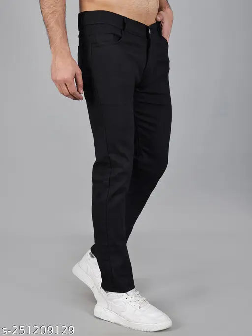 Stretchable black jeans for men, polycotton, solid fit for daily wear. Machine washable, mid-rise, slim fit, button closure. Breathable fabric, quality zippers, anti-corrosive buttons. Made with care in India, waist sizes 28, 30, 32 (length size: 39in)