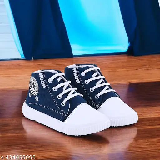 The image displays a pair of children's casual shoes in white and blue. They appear to have laces, suggesting a standard shoe design. Indoor-outdoor suitability is implied by the term 'indian walk,' but no further information about other features or materials is provided. The phrase 'skin friendly' suggests that the materials used are gentle on the skin, which may appeal to parents considering these shoes for their children