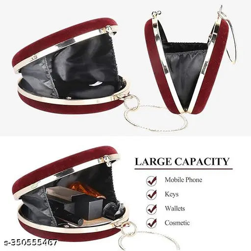 Luxurious maroon velvet clutch purse with a cell phone inside