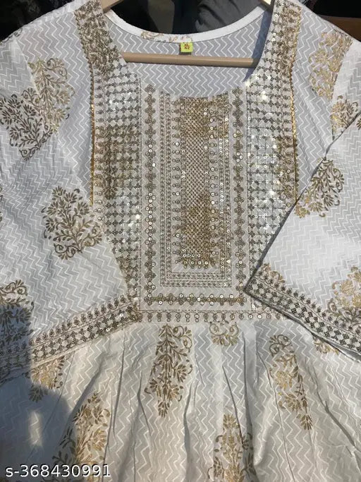 Gold rayon kurti, three-quarter sleeves, printed combo. Rayon Naira kurti in various sizes (M: 38in bust, L: 40in bust, XL: 42in bust, XXL: 44in bust, XXXL: 46in bust, 4XL: 48in bust, 5XL: 50in bust, 6XL: 52in bust), made in India