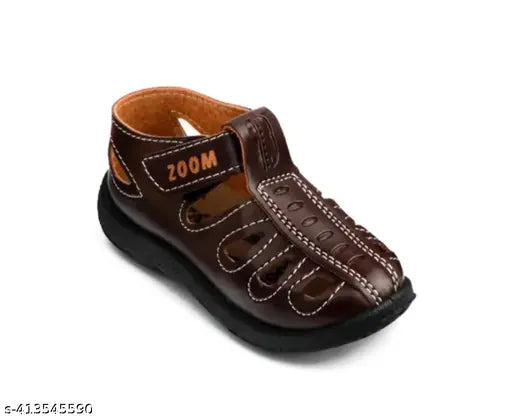 Black and brown FABALOUS kids' sandals with 'Zoom' written on straps