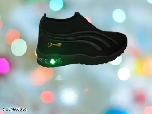 Black sports shoe with lit up sole