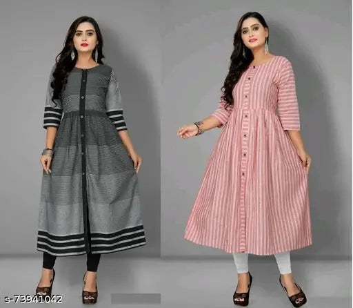 Three women in salwar kameez dresses. Black, gray, and pink kurti dresses with white bottoms