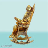 Metal Ganesh Reading Idol, Hindu god on swinging chair, Diwali decorative showpiece (6x14x8cm)