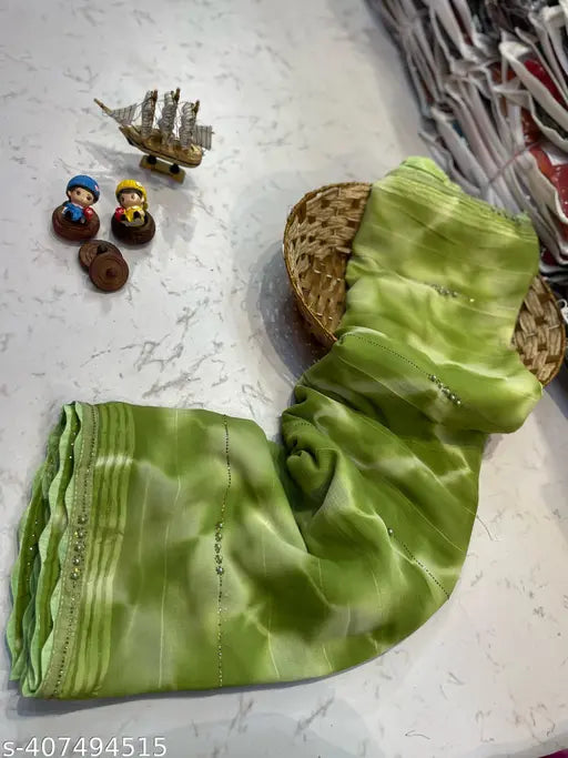 Green saree with beige border
