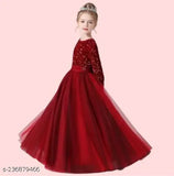 Red net and velvet sequin gown for kids' parties, embroidered with fair pattern and gathered fitting. Single piece in polythene bag, dry clean only. Indian children's formal wear