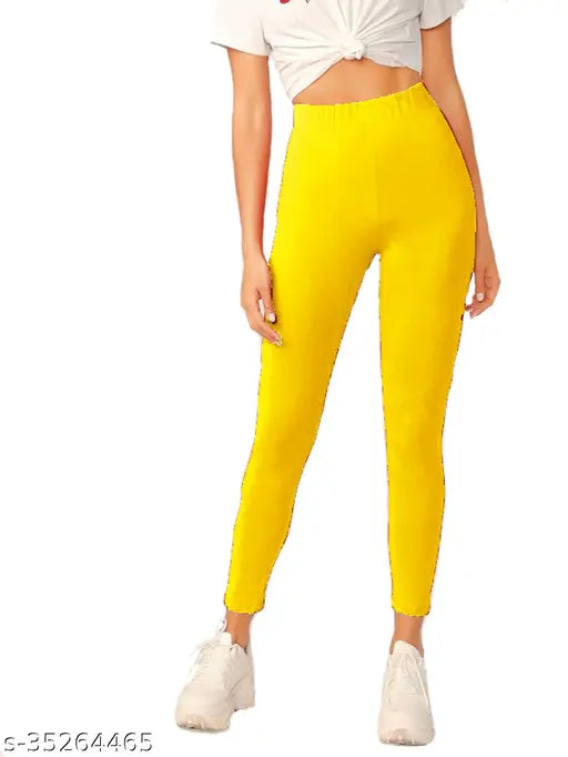 Stretchable cotton blend women's jeggings, solid-colored and available in sizes 26, 28, 30, 32, 34 (inches). Indian-made leggings for women on display