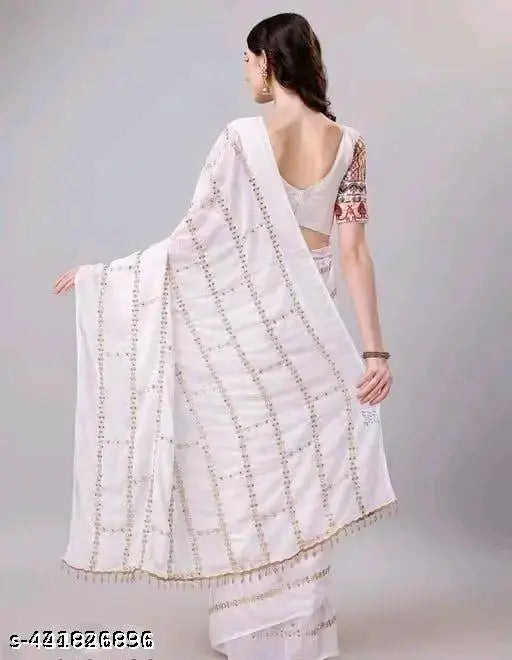 White saree with border embellishments, full length, long pallu