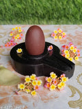 Natural multicolor Narmadeshwar Shivling, 15-inch tall with 3-inch base, handcrafted from Narmada stone for home pooja