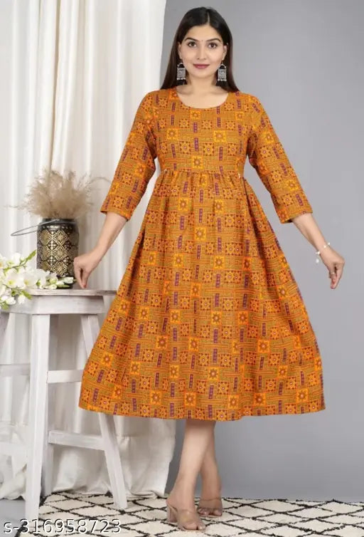 Orange maternity kameez with long sleeves and flared skirt. Comes in a set of two