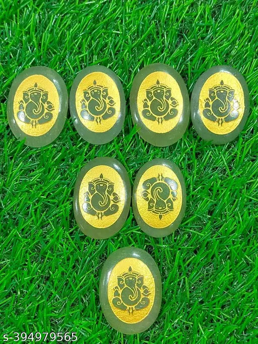 Natural green jade Ganesha coin, oval shape, wealth and good luck symbol