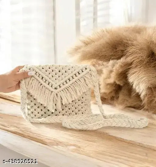 Handcrafted bohemian cotton tote with tassel accents, suitable for casual and beach styles