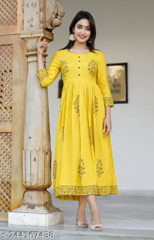 Women's mustard yellow anarkali kurti with black block print, embroidered details