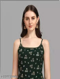 A sleeveless kurta dress in a georgette pattern, with shimmering foil work and a hem ending into shararas