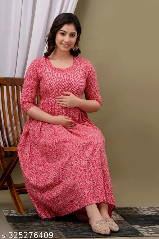 Pink cotton maternity nightgown with V neck, long sleeves and side slit