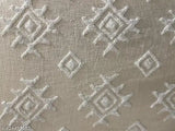 Soft, plush, cotton blend, slubbed and tufted throw